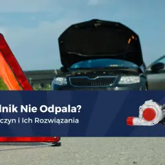 Awaryjny trójkąt i auto z otwartą maską. Silnik diesel zgasł podczas jazdy i nie odpala.